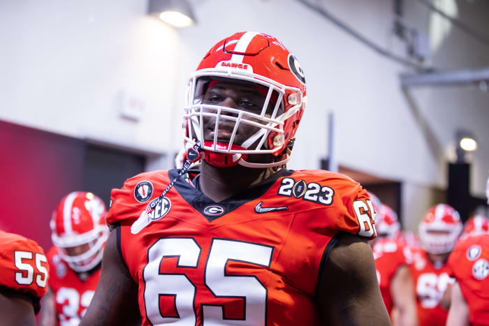 Jan 9, 2023; Inglewood, CA, USA; Georgia Bulldogs offensive lineman Amarius Mims (65) against the TCU Horned Frogs during the CFP national championship game at SoFi Stadium.